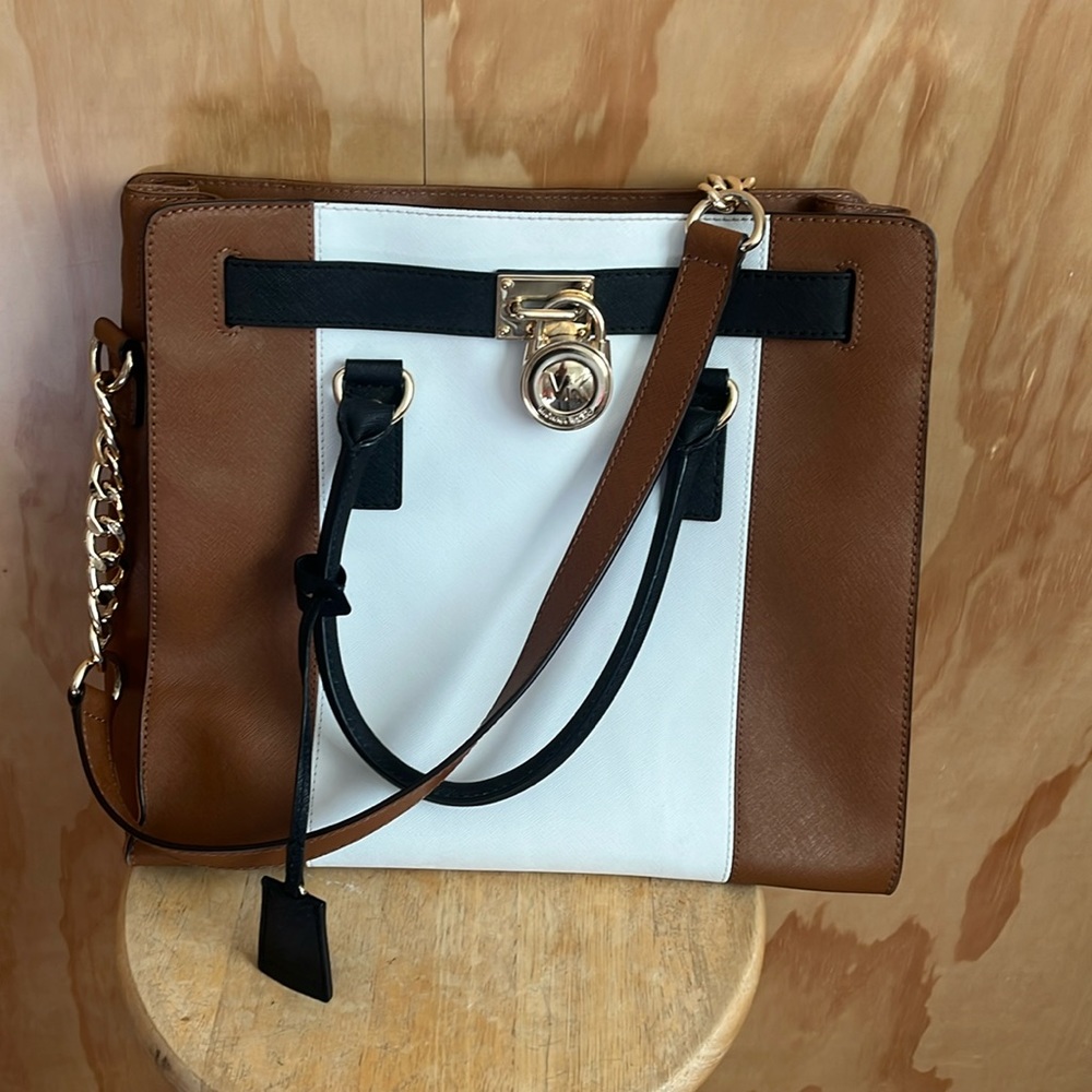 Micheal Kors color block. Brown, cream and black bag. In almost perfect shape.